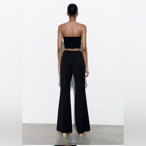 NWT Zara high wasted pants. Flared legs. Side hidden in seam zip closure.